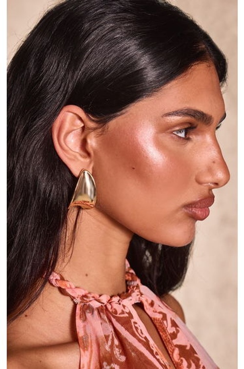 Gold Curve Statement Earrings product thumbnail 4